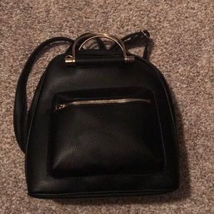 Black backpack purse